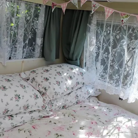 Kitty Unique 60s Caravan Set In Pretty Garden
